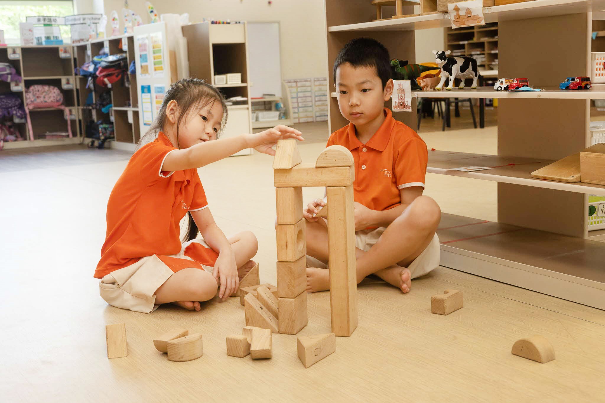 children playing with building blocks
